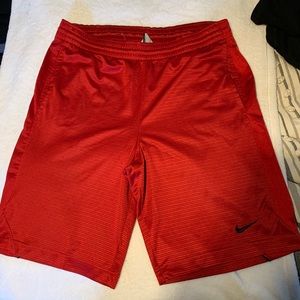 Red Nike shorts